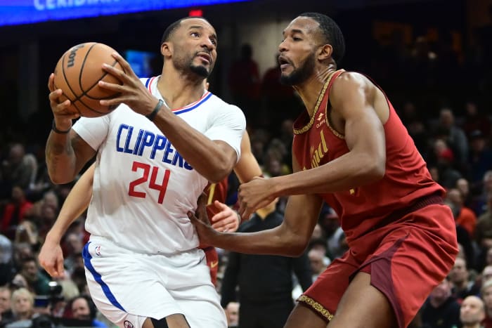 Jan 29, 2024; Cleveland, Ohio, USA; Los Angeles Clippers guard Norman Powell (24) drives to the basket against Cleveland Cavaliers forward Evan Mobley (4) during the second half at Rocket Mortgage FieldHouse. Mandatory Credit: Ken Blaze-USA TODAY Sports